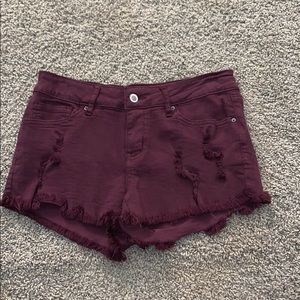 Distressed Burgundy Jean Shorts.